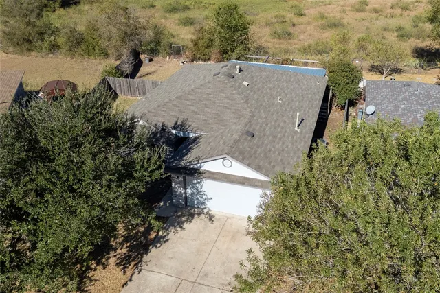 a view of a lake with a building in the background