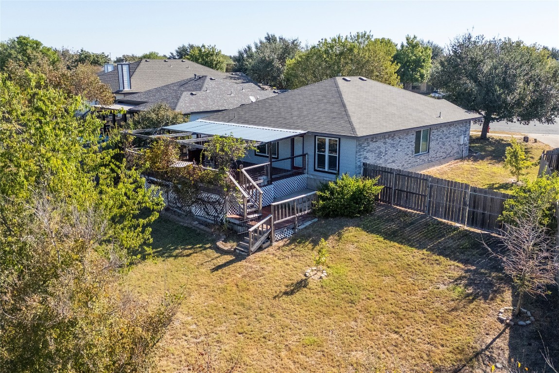 212 Valley Run Trail Elgin, TX 78621 - Photo 20 of 31 aerial view of a house with yard and mountain view in front of it