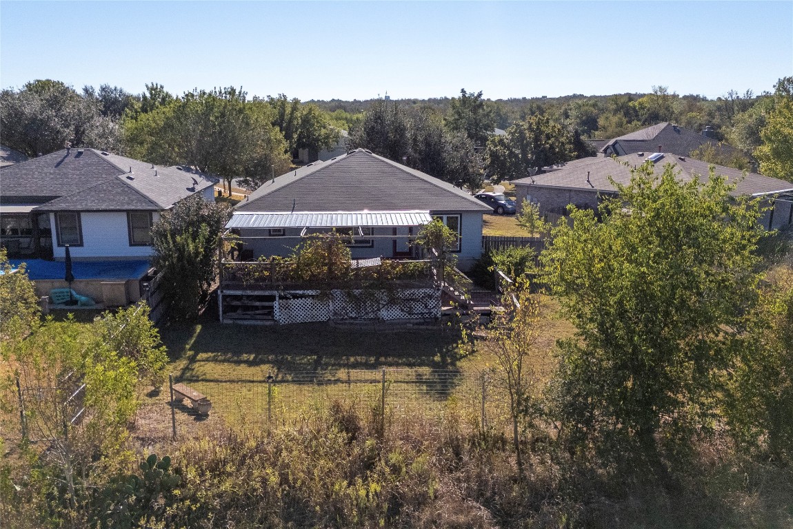 212 Valley Run Trail Elgin, TX 78621 - Photo 22 of 31 a house with trees in the background