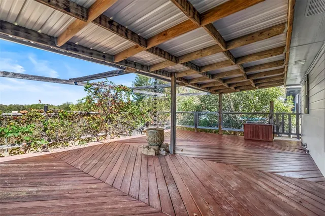 a view of outdoor space with wooden floor and outdoor space