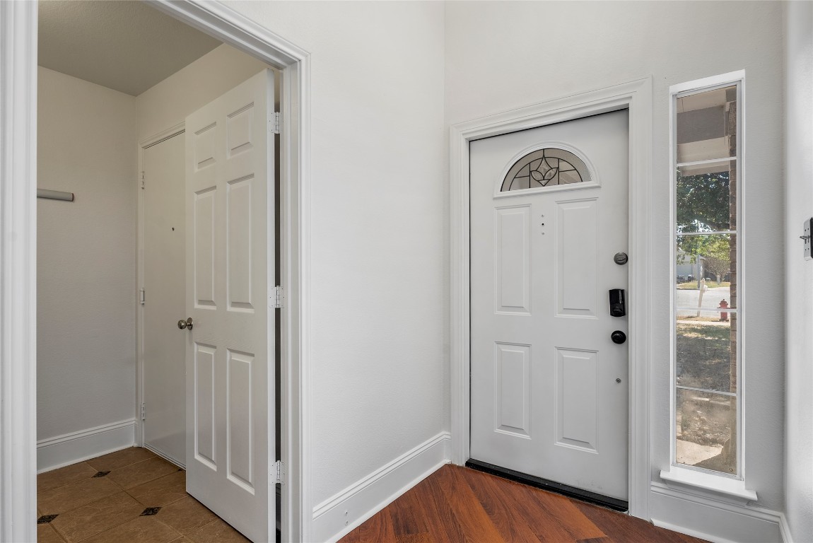 212 Valley Run Trail Elgin, TX 78621 - Photo 10 of 31 a view of front door with wooden floor