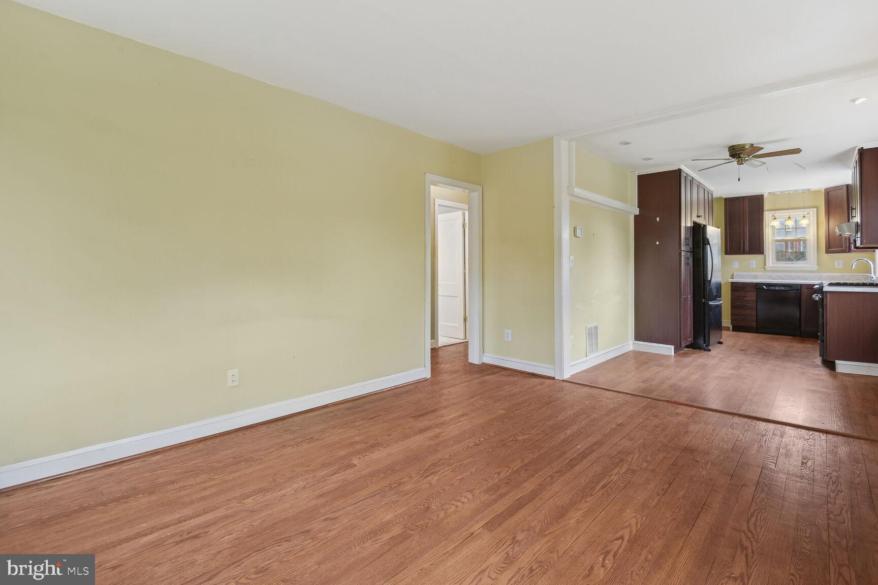 804 Dryden Street Silver Spring, MD 20901 - Photo 7 of 33 wooden floor in an empty room with a window
