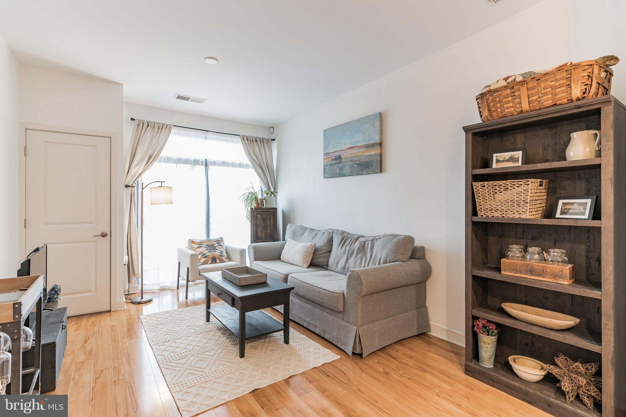 8005 13th Street, Unit 101 Silver Spring, MD 20910 - Photo 6 of 29 Light filled living room