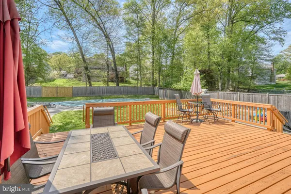 a view of a patio with couches table and chairs