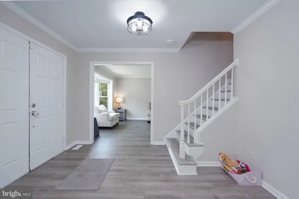 a view of entryway with livingroom and furniture