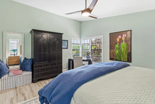 a bathroom with a bathtub a sink and a mirror