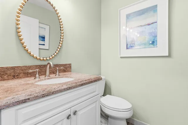a kitchen with a stove and a cabinets