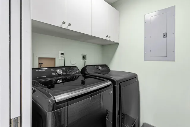 a view of a hallway view with staircase