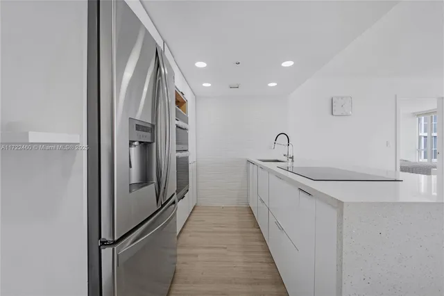 a bathroom with a sink and mirror