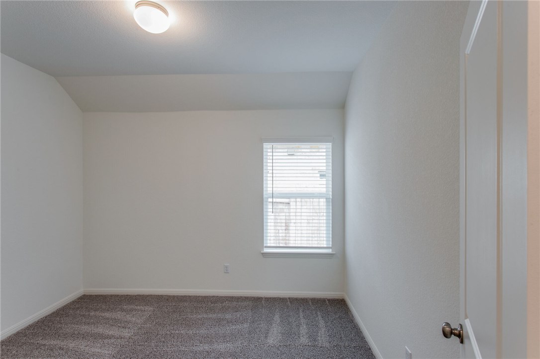 312 Prato Place Georgetown, TX 78628 - Photo 13 of 33 an empty room with a window