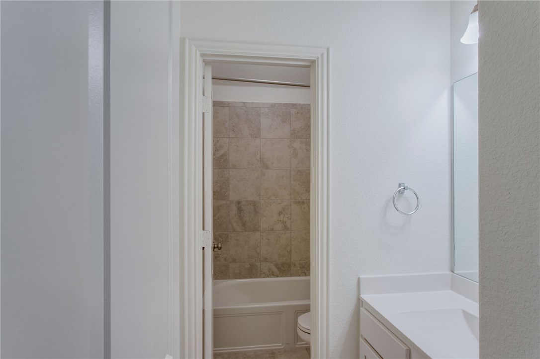 312 Prato Place Georgetown, TX 78628 - Photo 15 of 33 a bathroom with a shower
