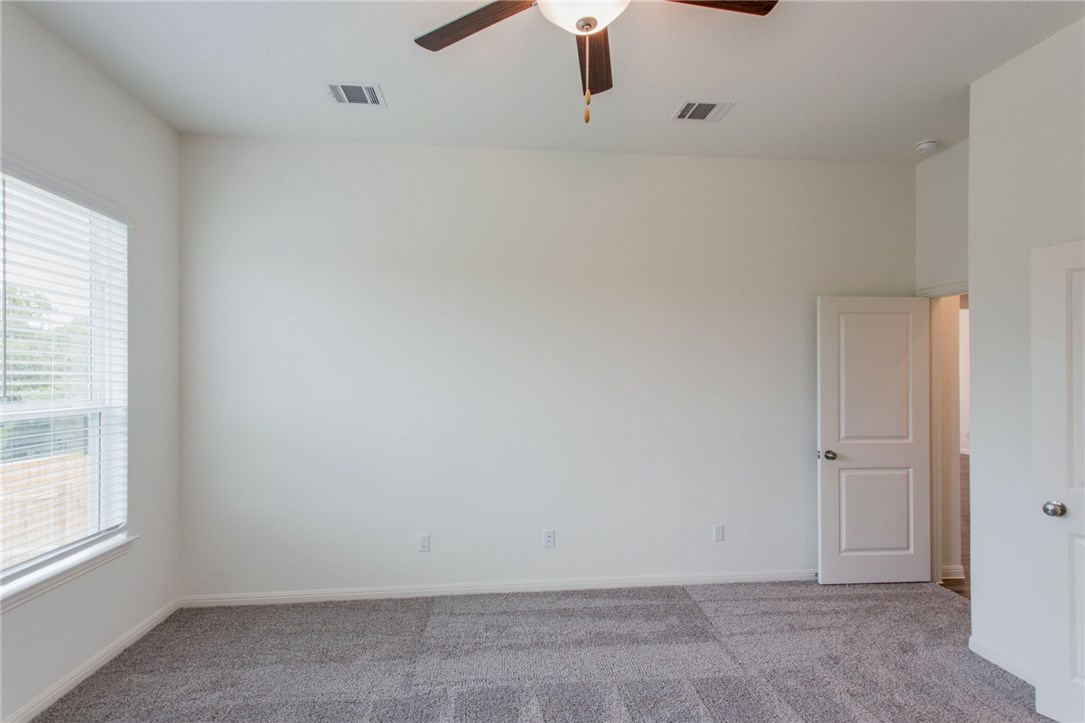312 Prato Place Georgetown, TX 78628 - Photo 20 of 33 an empty room with window