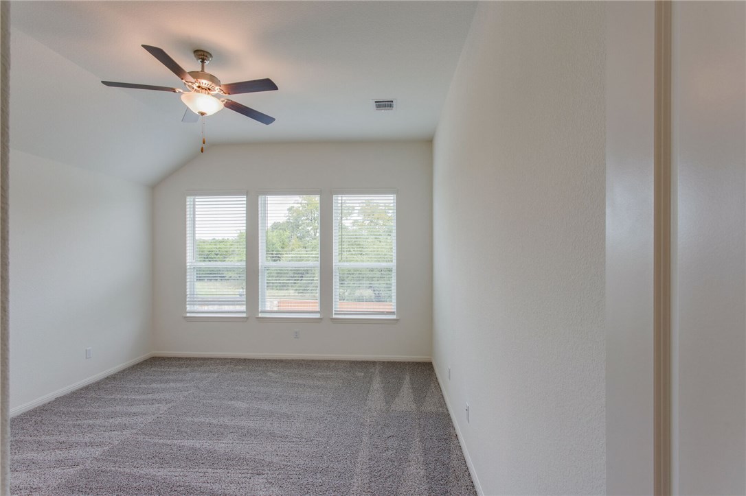312 Prato Place Georgetown, TX 78628 - Photo 23 of 33 a view of an empty room with a window
