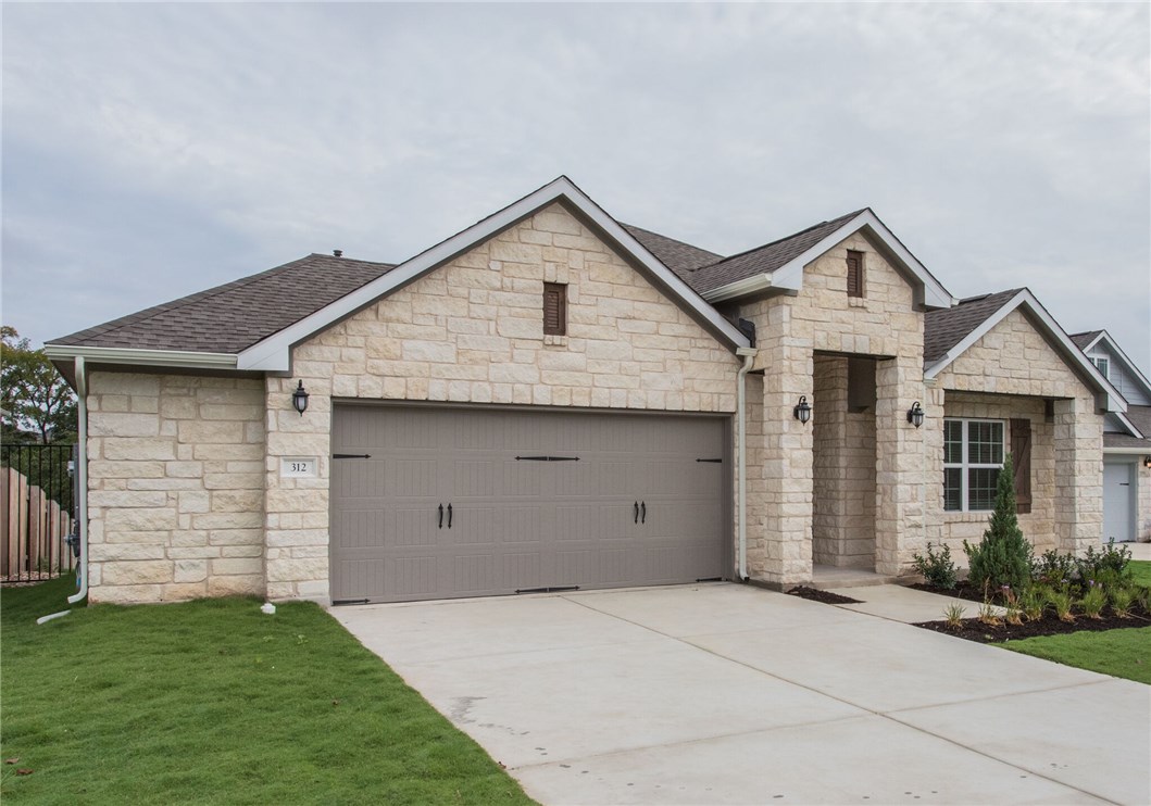 312 Prato Place Georgetown, TX 78628 - Photo 3 of 33 a front view of house with yard
