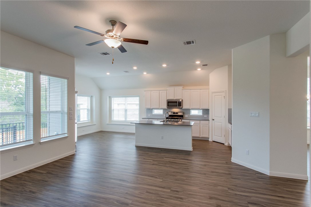 312 Prato Place Georgetown, TX 78628 - Photo 31 of 33 a view of kitchen with sink and wooden floor