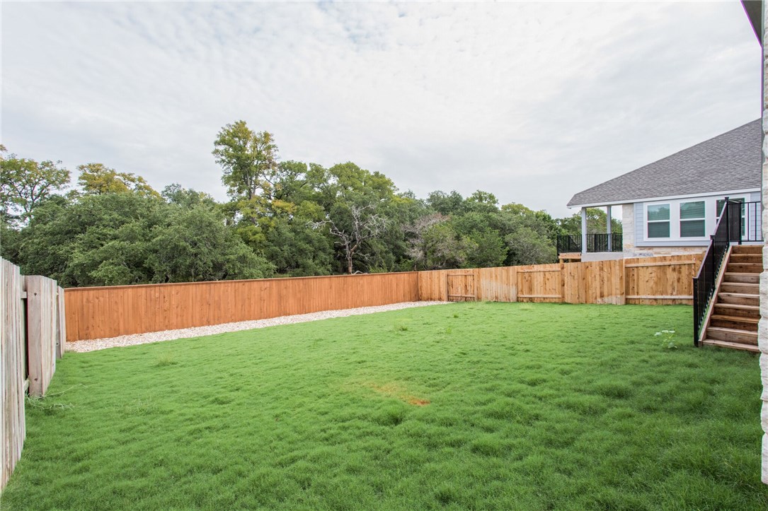 312 Prato Place Georgetown, TX 78628 - Photo 5 of 33 a view of yard with swimming pool and deck