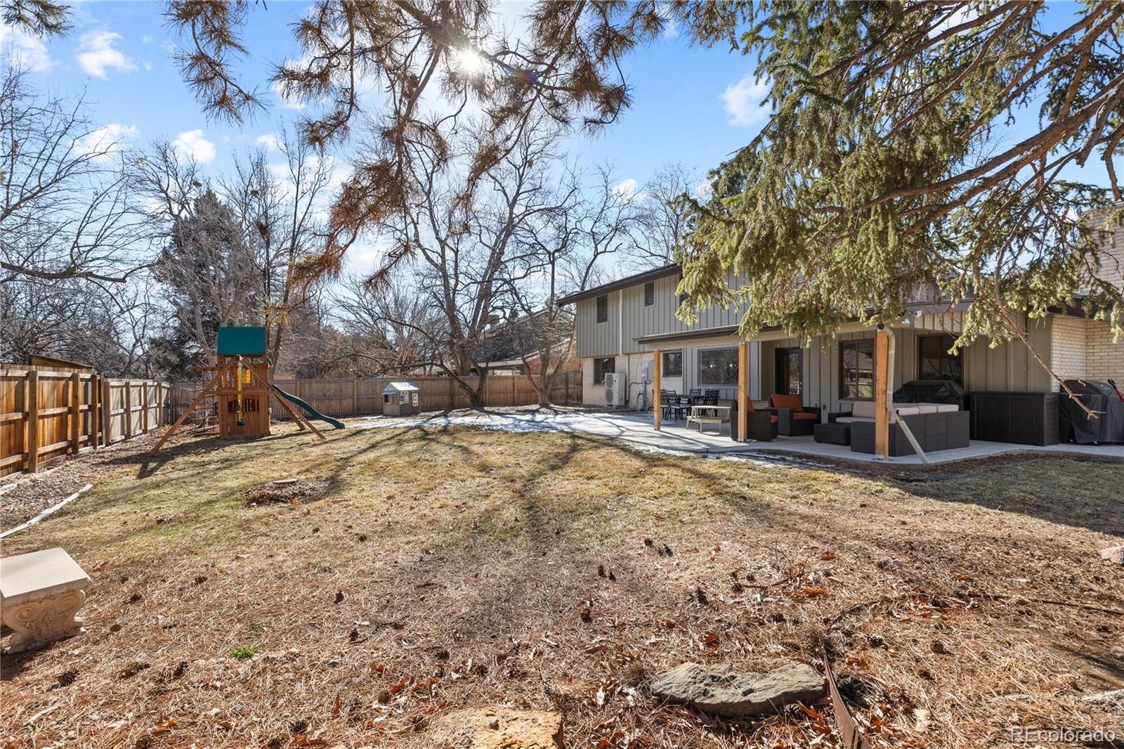 3764 South Niagara Way Denver, CO 80237 - Photo 44 of 50 a view of a yard with a large tree