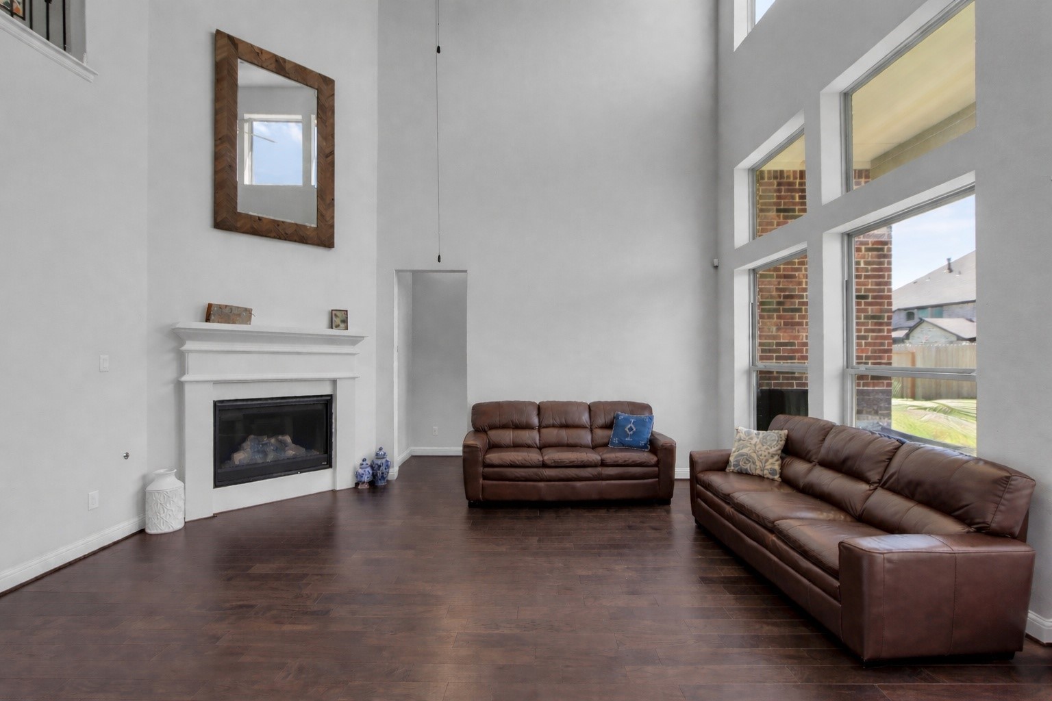 423 Round Top Street Webster, TX 77598 - Photo 13 of 49 Soaring ceilings and great natural light.