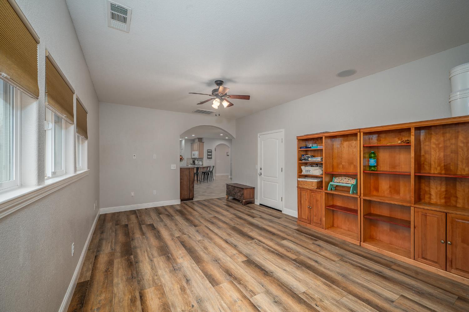 4530 Maximus Road Denair, CA 95316 - Photo 13 of 36 a view of a livingroom with a staircase