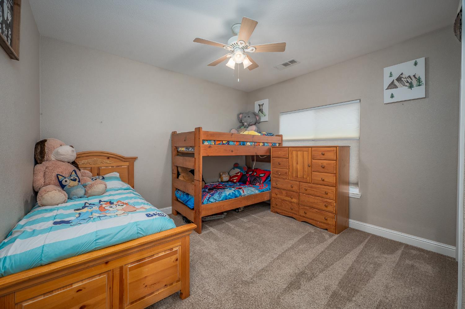 4530 Maximus Road Denair, CA 95316 - Photo 19 of 36 a bedroom with a bed and furniture