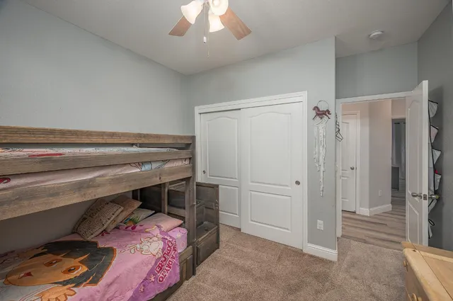 a bedroom with a bed and a shower