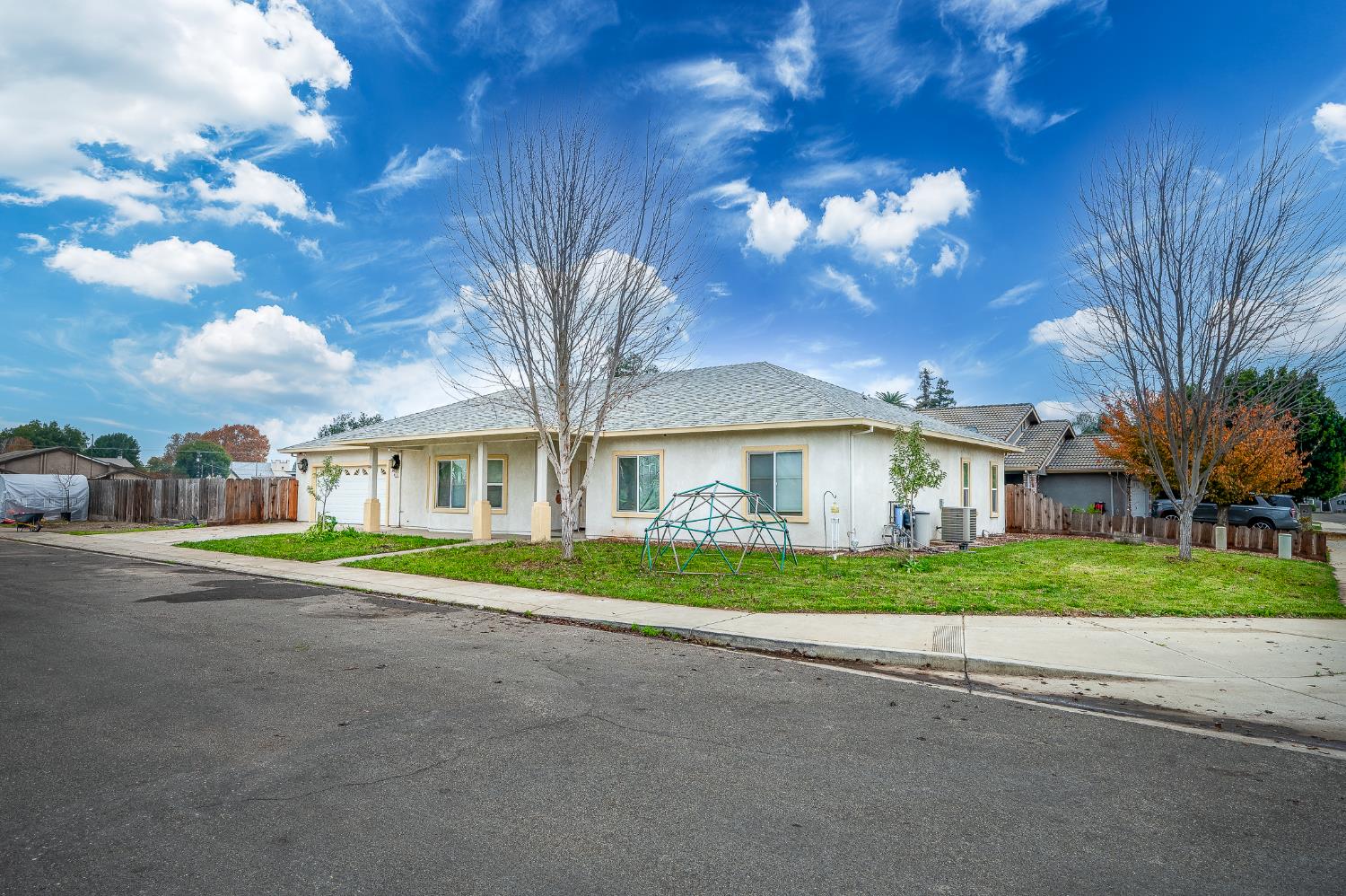 4530 Maximus Road Denair, CA 95316 - Photo 4 of 36 a front view of a house with a yard
