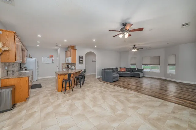 a view of kitchen with furniture and a table