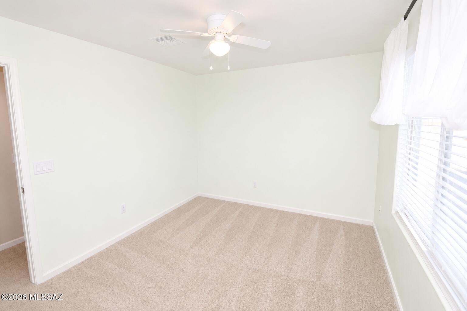 11484 East Desert Raptor Loop Tucson, AZ 85747 - Photo 18 of 28 a view of an empty room