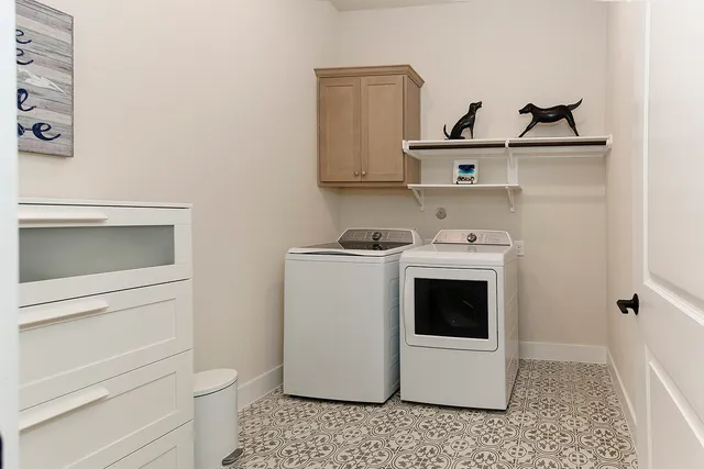 a utility room with a washer and dryer