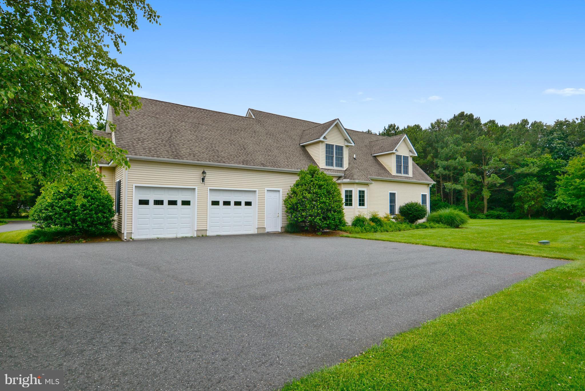 24787 Swan Road St. Michaels, MD 21663 - Photo 25 of 30 Large two car garage and lots of parking area