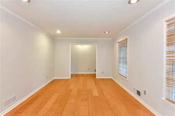 a view of an empty room with a window