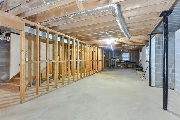 a view of a room with wooden walls