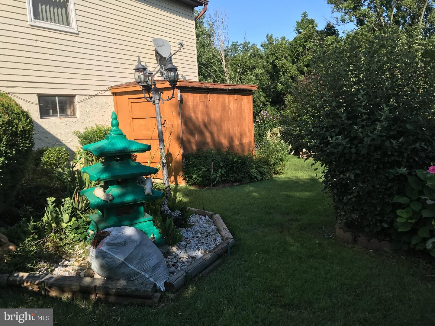 15213 Wayside Road Philadelphia, PA 19116 - Photo 21 of 25 a view of statue in a garden