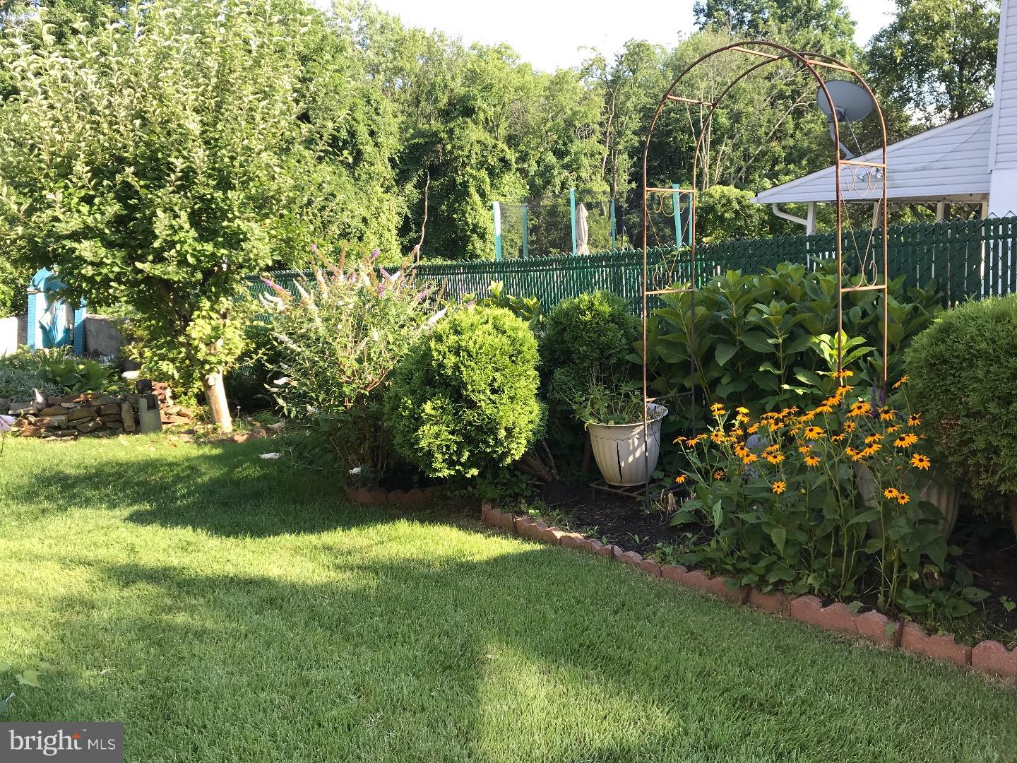 15213 Wayside Road Philadelphia, PA 19116 - Photo 22 of 25 a view of a garden from a lake view