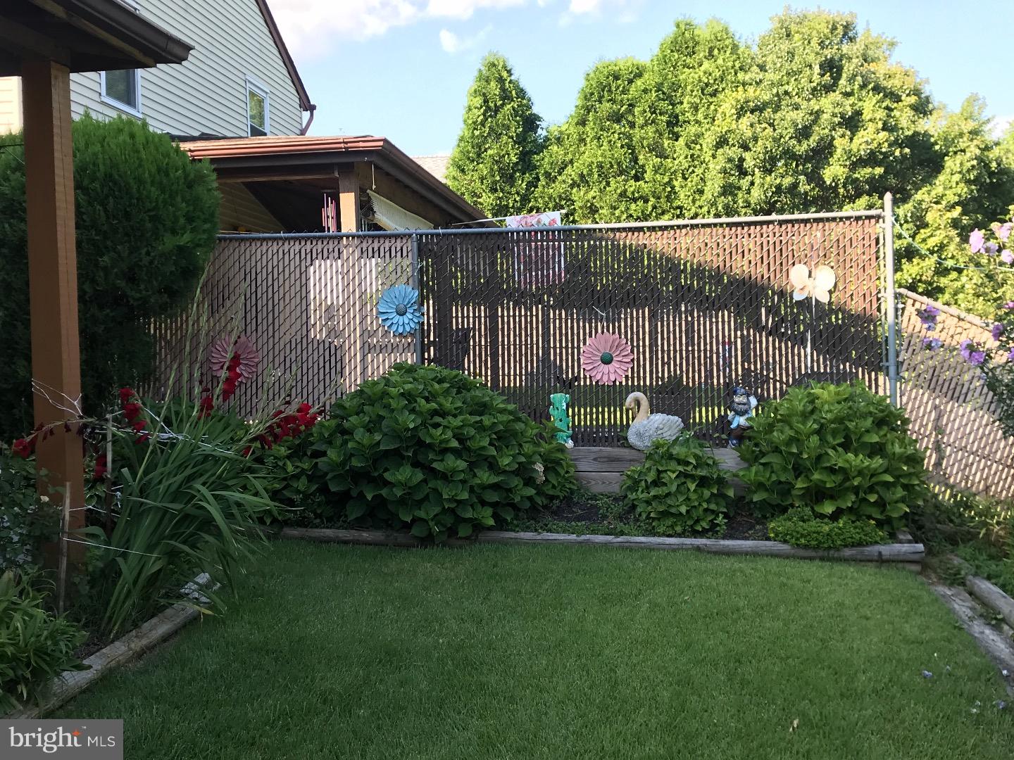 15213 Wayside Road Philadelphia, PA 19116 - Photo 24 of 25 a view of a backyard with plants