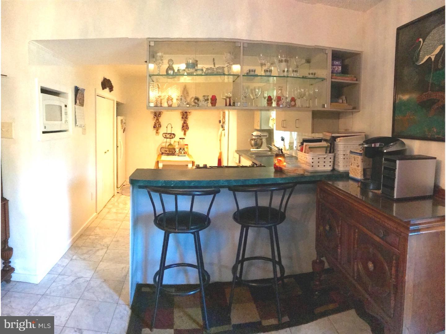 15213 Wayside Road Philadelphia, PA 19116 - Photo 6 of 25 a dining room with a table and chairs