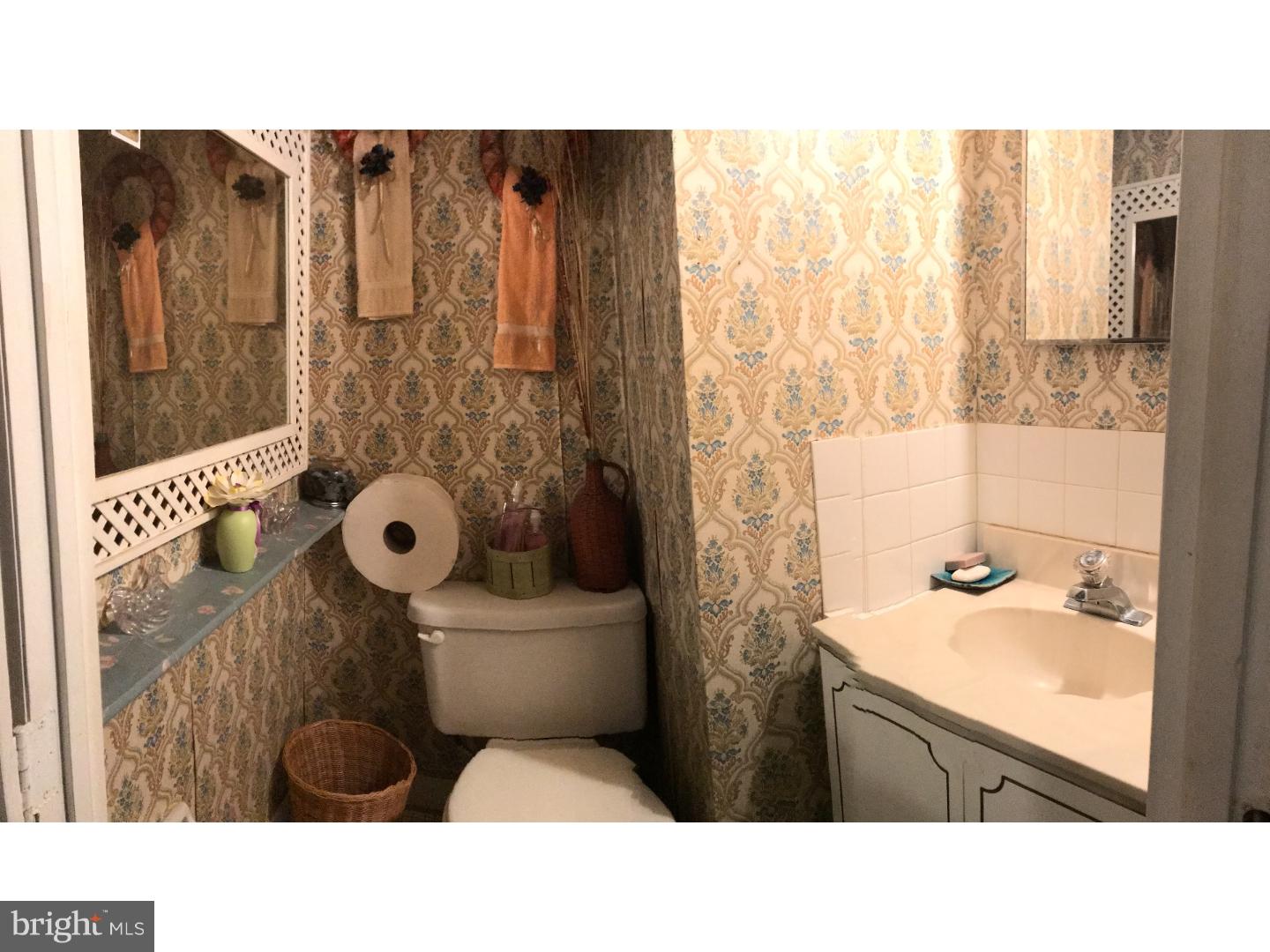 15213 Wayside Road Philadelphia, PA 19116 - Photo 9 of 25 a bathroom with a sink toilet and shower