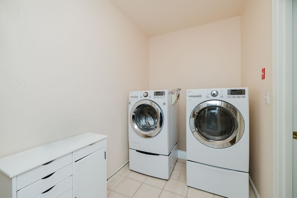32 Village Way, Unit 32 Westport, MA 02790 - Photo 13 of 15 a utility room with dryer and washer