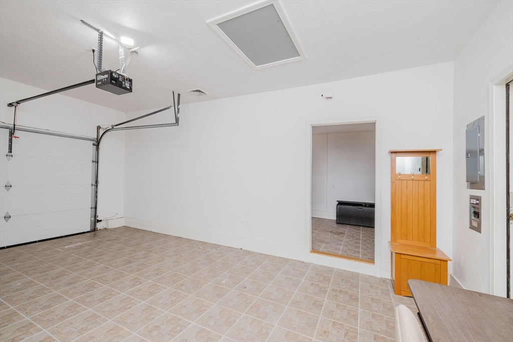 32 Village Way, Unit 32 Westport, MA 02790 - Photo 14 of 15 a view of a room with a barbeque