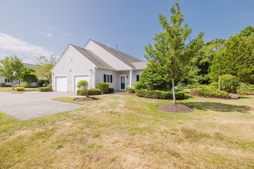 32 Village Way, Unit 32 Westport, MA 02790 - Photo 15 of 15 a view of backyard of the house
