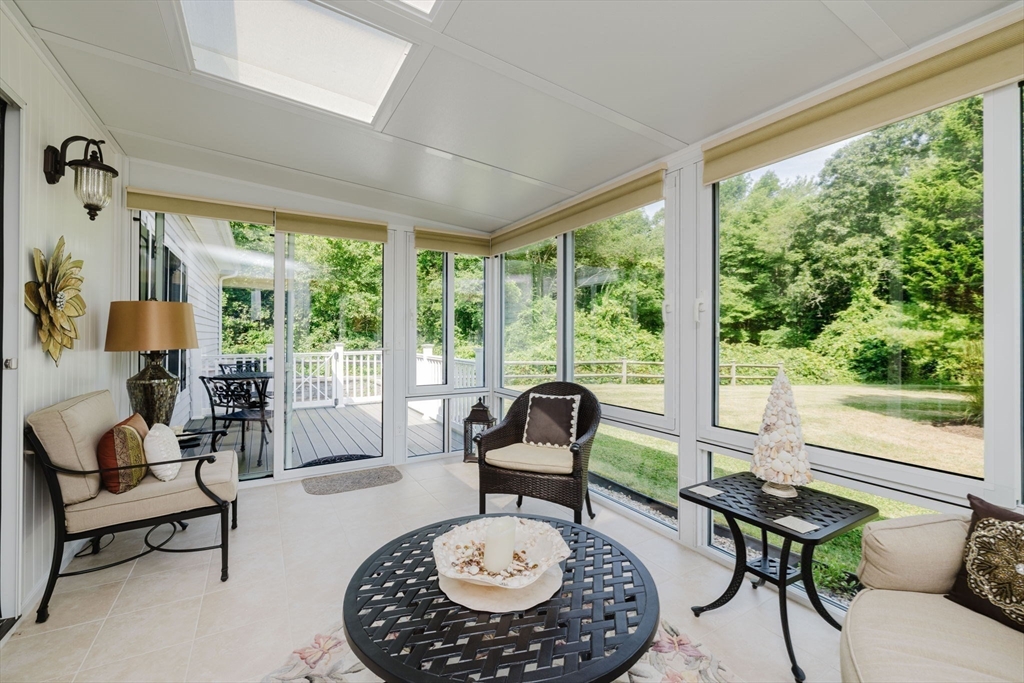 32 Village Way, Unit 32 Westport, MA 02790 - Photo 7 of 15 a living room with furniture and a large window