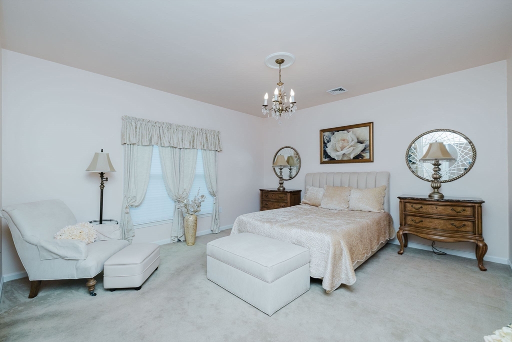 32 Village Way, Unit 32 Westport, MA 02790 - Photo 10 of 15 a bedroom with bed and window