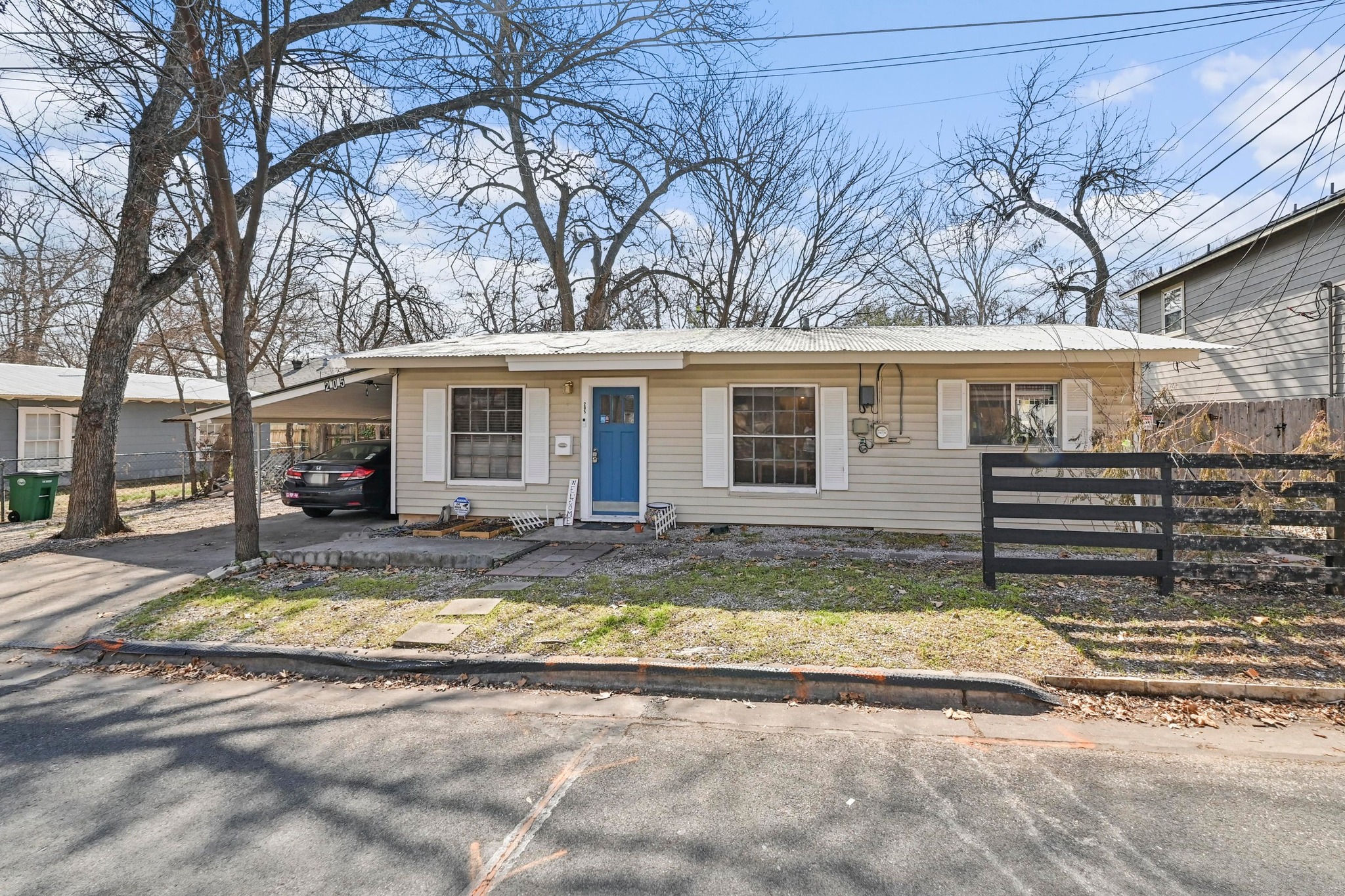 4530 Avenue D, Unit B Austin, TX 78751 - Photo 3 of 29 a view of house with backyard and tree