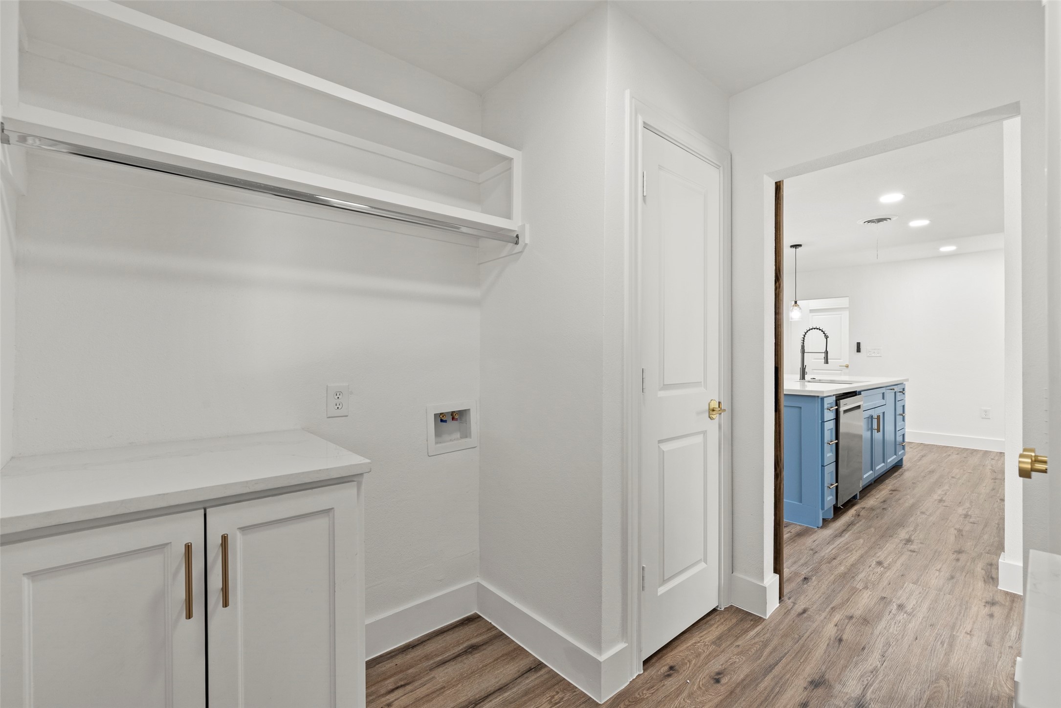 126 Daisy Street Lake Jackson, TX 77566 - Photo 12 of 36 a view of a hallway with wooden floor