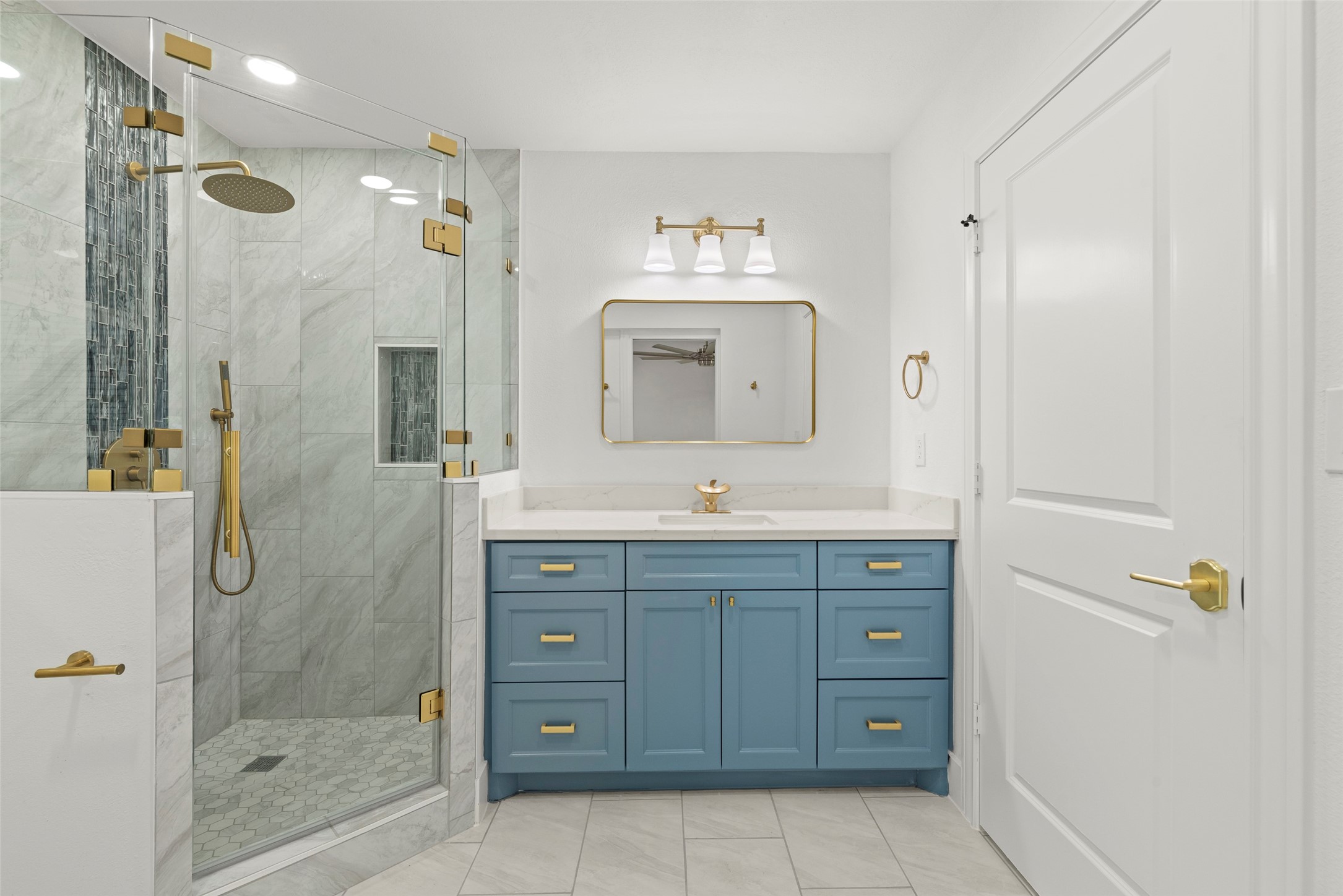 126 Daisy Street Lake Jackson, TX 77566 - Photo 22 of 36 a bathroom with a granite countertop sink mirror and shower