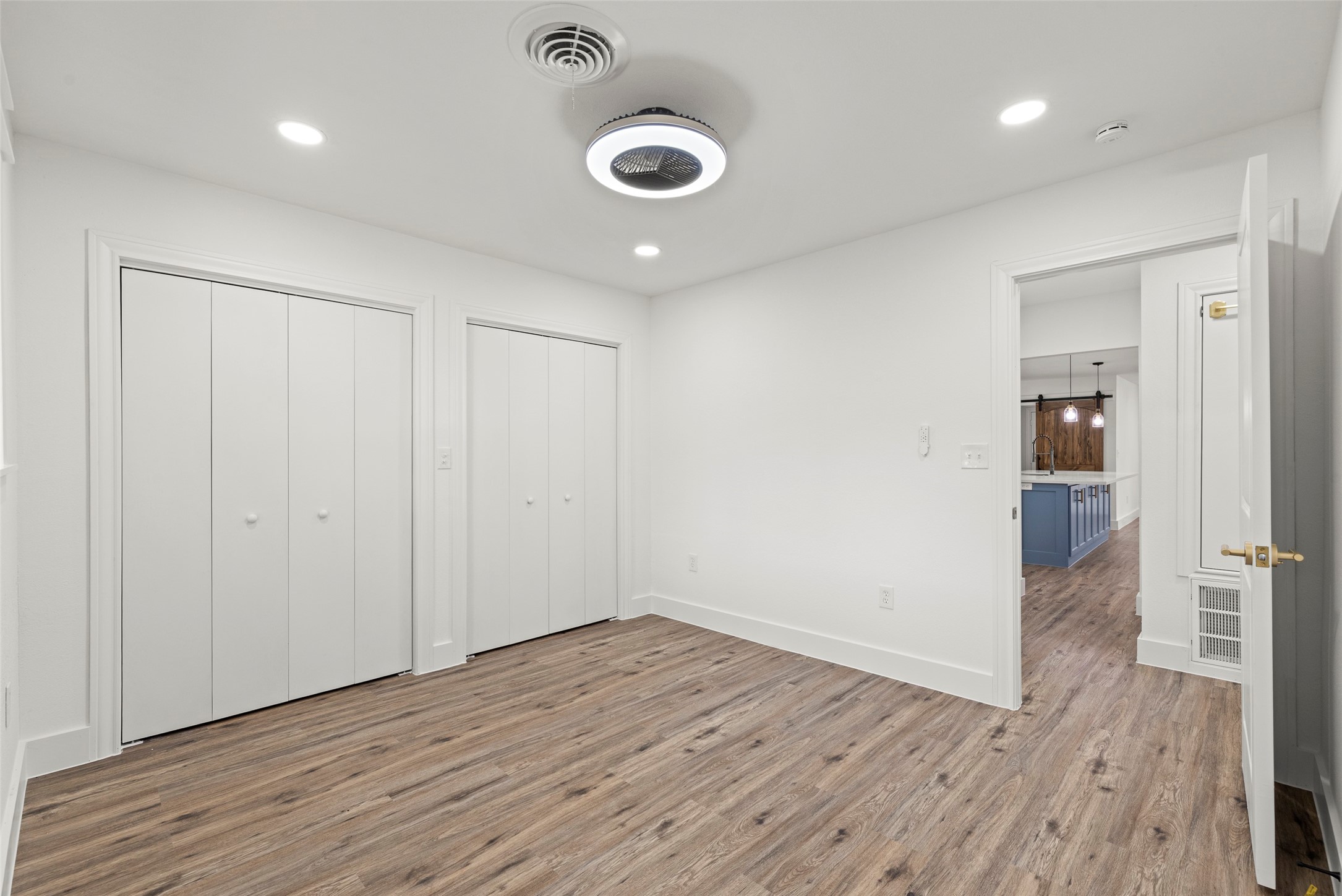 126 Daisy Street Lake Jackson, TX 77566 - Photo 25 of 36 a view of a hallway with wooden floor
