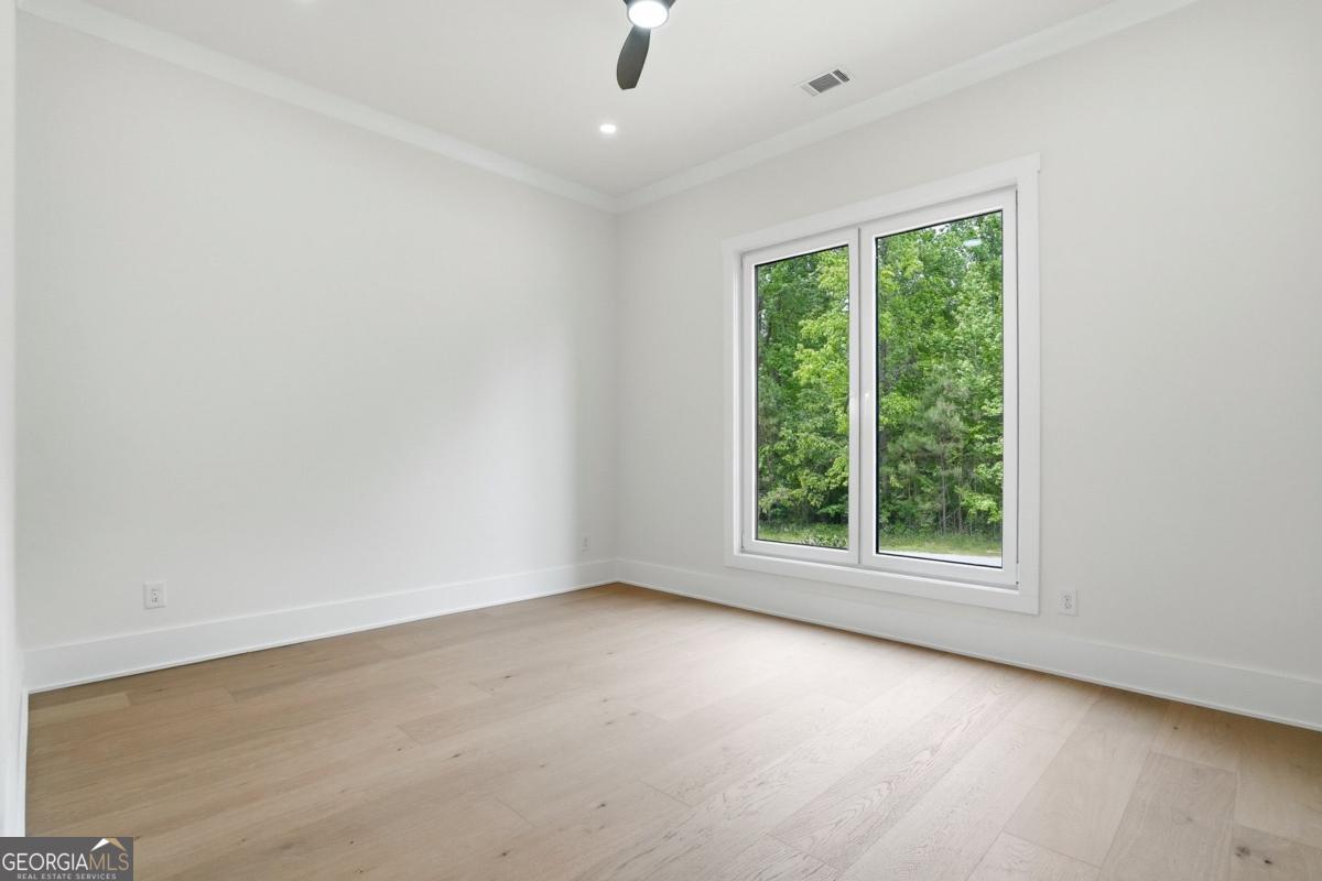 1557 Whitley Road Dacula, GA 30019 - Photo 32 of 46 an empty room with a window