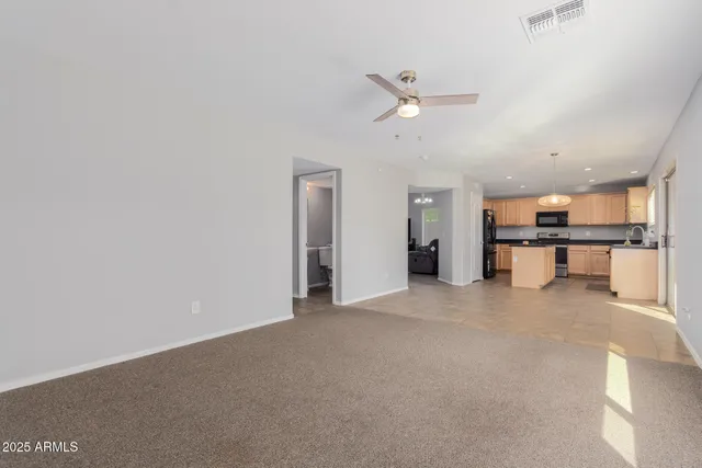 a view of a kitchen with a sink