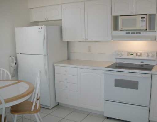 1154 Via Jardin, Unit 1154 Riviera Beach, FL 33418 - Photo 7 of 16 a view of a storage and utility room with washer and dryer