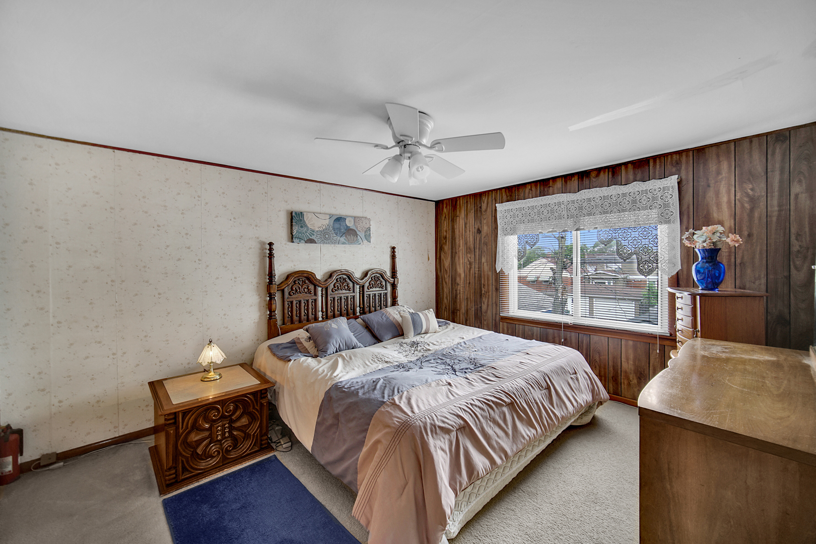 1453 Shell Street Hammond, IN 46320 - Photo 13 of 23 a bedroom with a bed and a large window